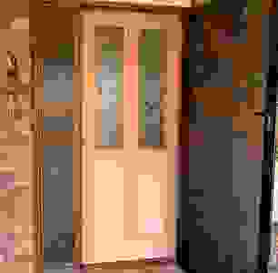 Kookaburra timber door with knob entrance handle.