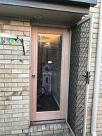 One lite Clear glass laundry external door.