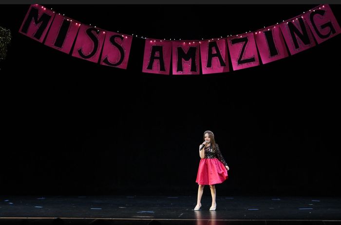Reagan performing at Miss Amazing 2025 in Medfield, MA