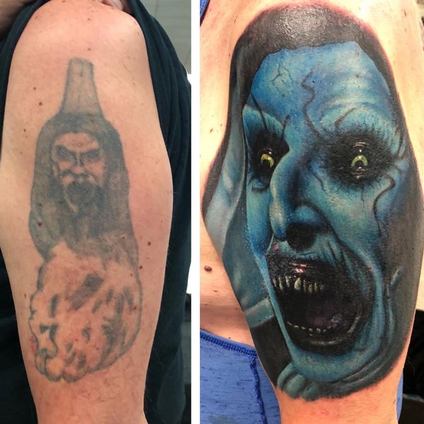 Cover up tattoo of the horror character the nun
