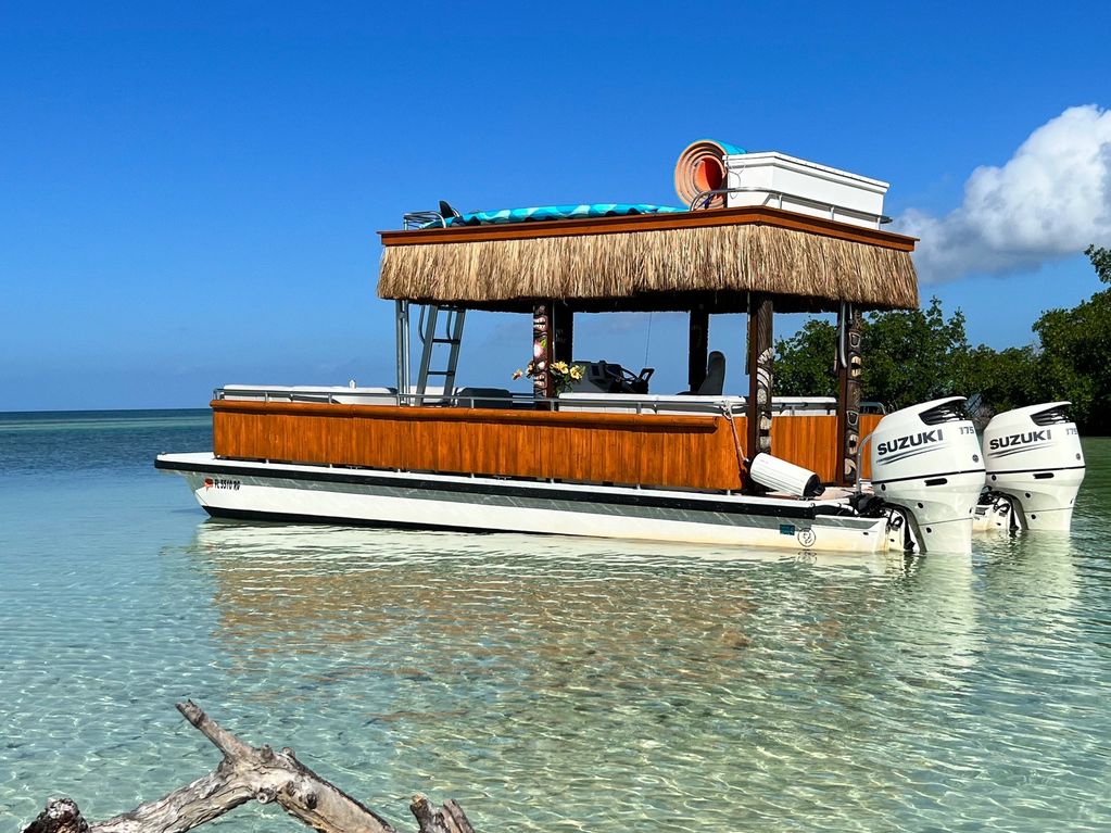 Experience Our Tiki Boat Adventures