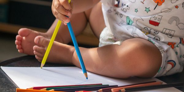 A child learning how to color 