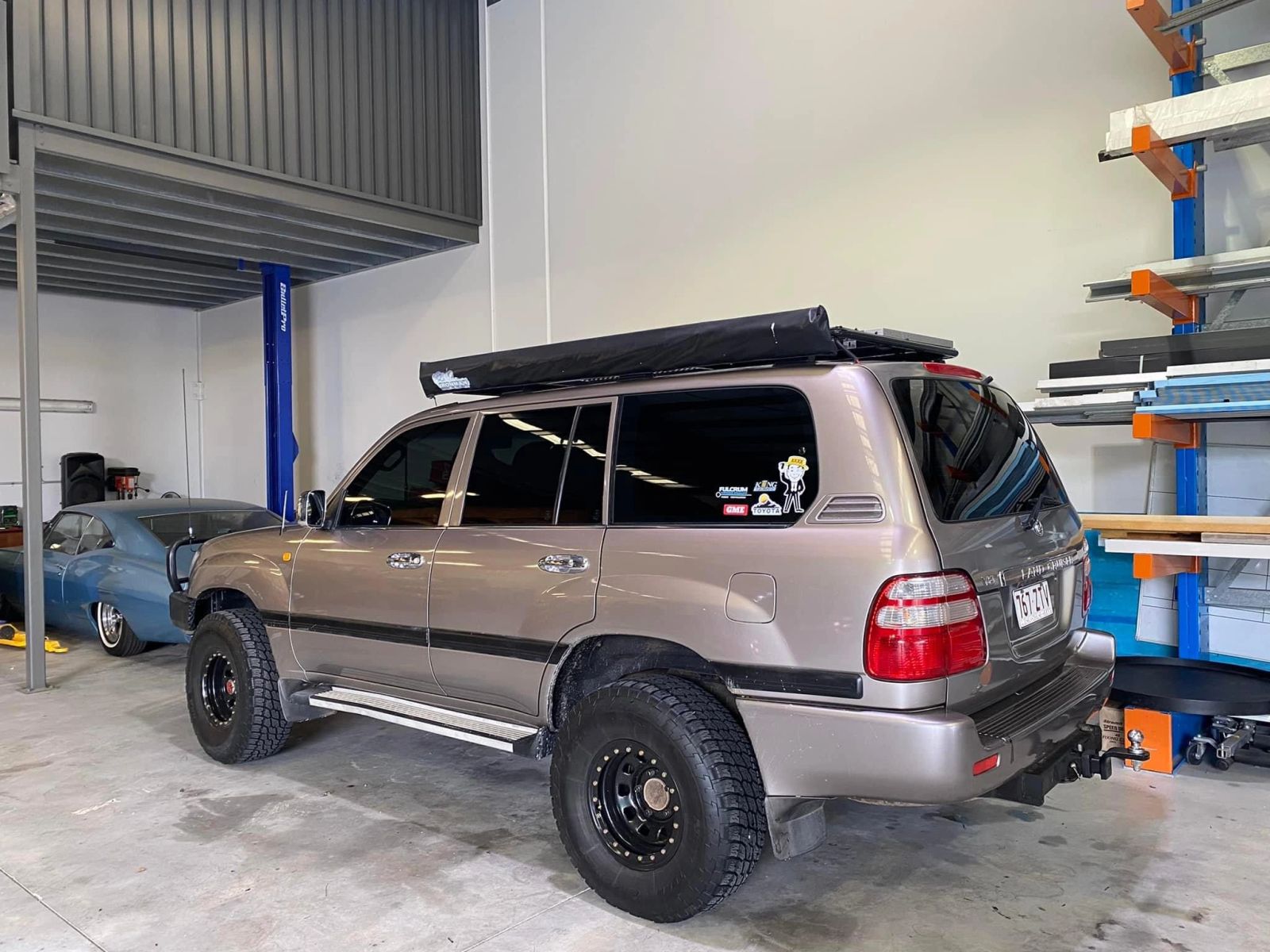Toyota LandCruiser being tinted in a home garage