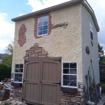 Stucco, brick and stone veneer 