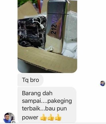 A gift box with a 212 VIP perfume and a thank you message in Malay.