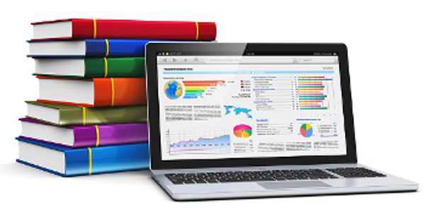 a stock photo of a stack of Books and computer