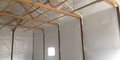 Interior pole barn showing insulation option.  Pole building insulation