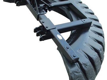 Curved metallic black structure with ridges.
