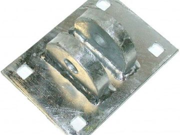 Metal bracket with four square holes.