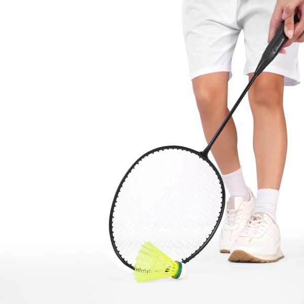 Person playing badminton, holding a racket with a shuttlecock.