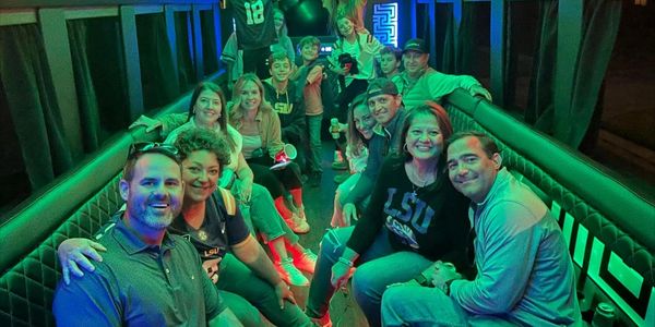 Group of people having fun on party bus
