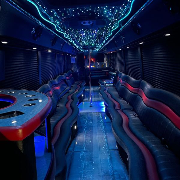 Party bus with blue lighting and personal bar