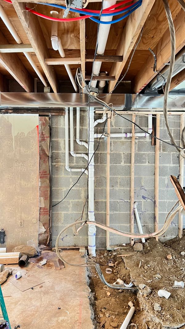 PVC piping connection on outer wall