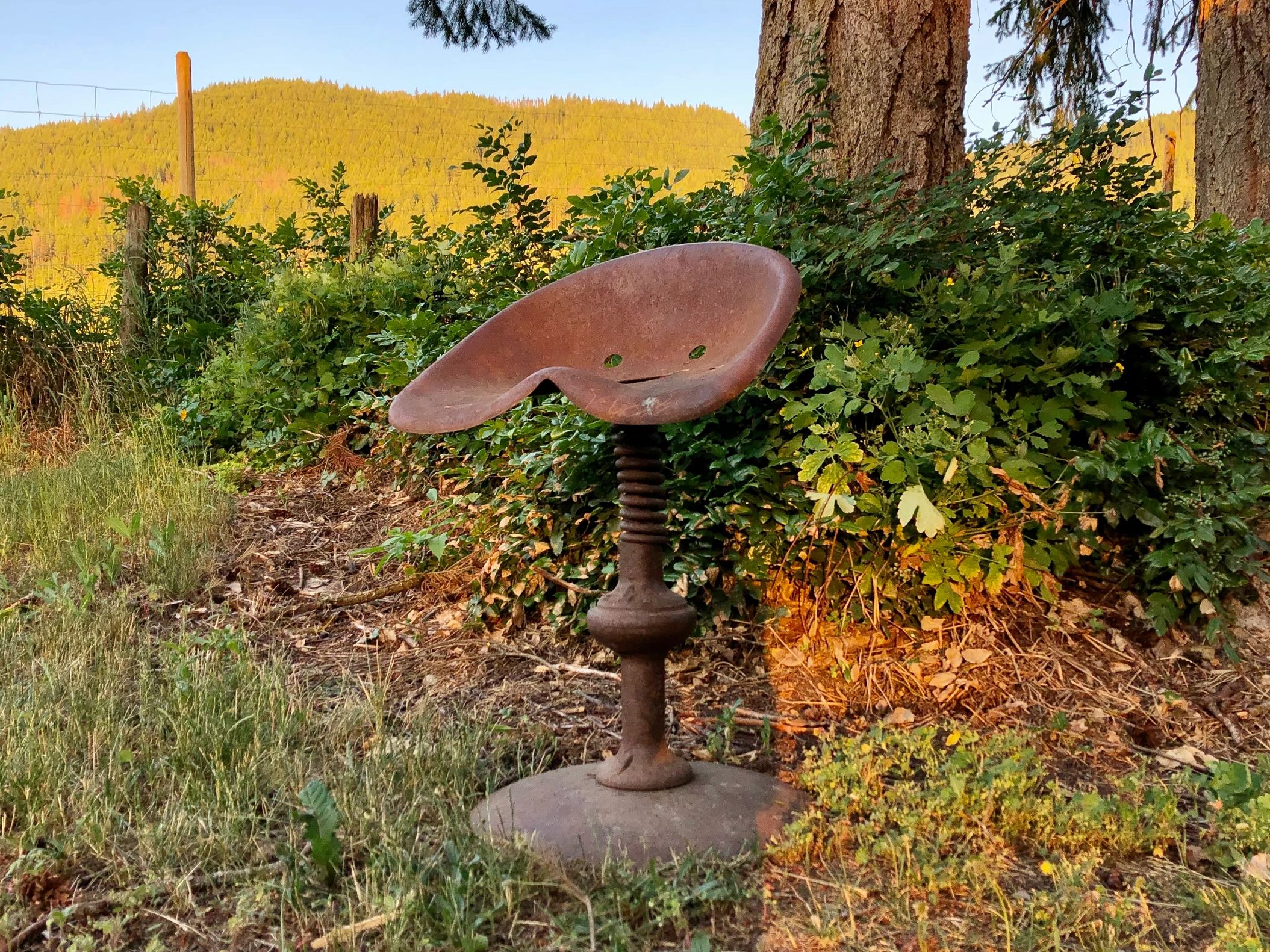 Rusticana Rentals - The Deere (homemade tractor seat stool)