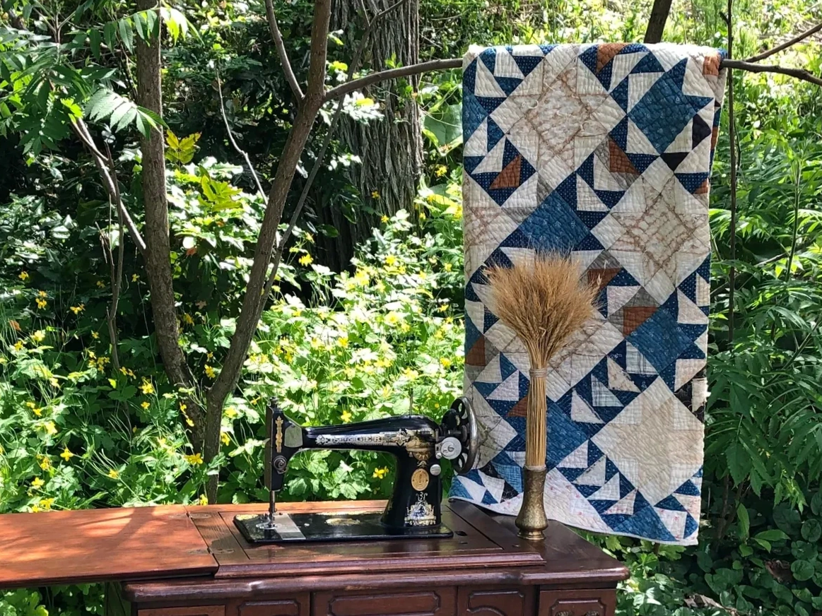 Rusticana Rentals - Grandma's Comfort (antique quilts and singer sewing machine)