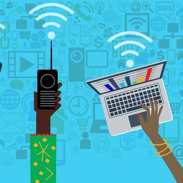 Hands holding walkie-talkie and laptop with Wi-Fi signals.