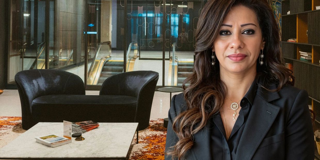 A person using a calculator to calculate the numbers.