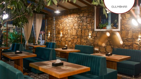 Poolside dining at Gulmohar by Visamo, multi-cuisine restaurant near Ahmedabad