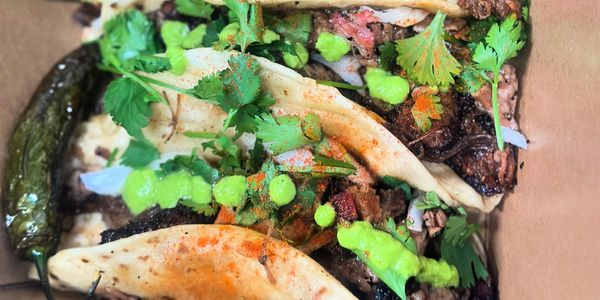 Prime Brisket & Jerk Chicken Taco's