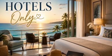 Luxurious hotel room with ocean view at sunset.