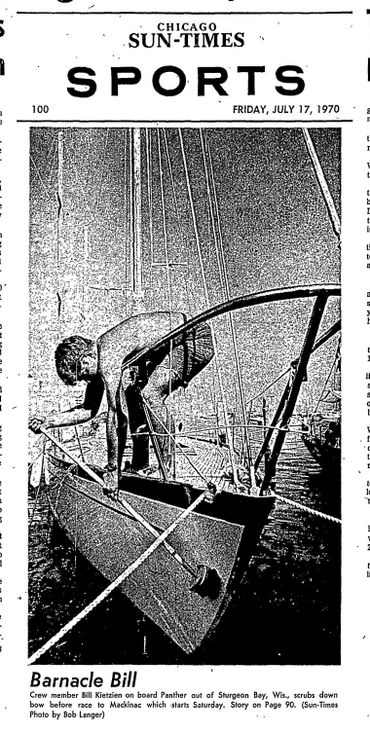 Crew member cleans boat bow before race in Sturgeon Bay, 1970.