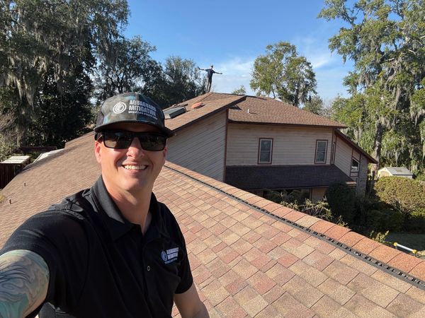 Selfie of our regional sales manager inspecting a roof.