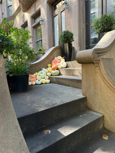 luxury fall porch  brownstone pumpkin display  New Jersey New Yorks pumpkin decorating service 