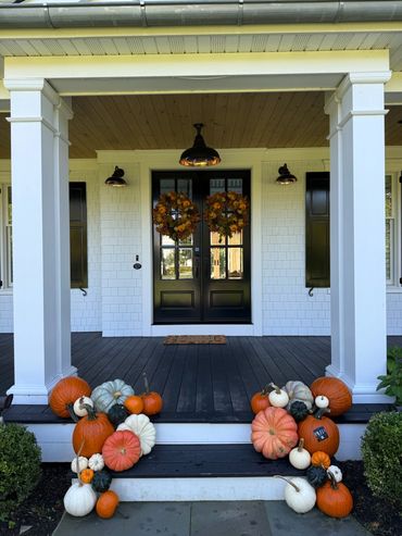 luxury fall porch  farmhouse pumpkin display  New Jersey New Yorks pumpkin decorating service 