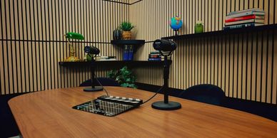 Roundtable recording studio at Ottawa Podcasts with multi-person seating around a table for panel di