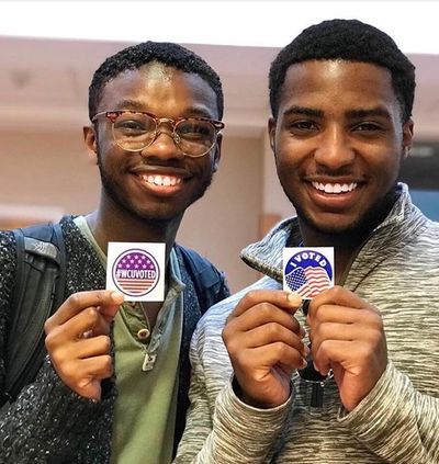 Photo of WCU voters with I Voted stickers