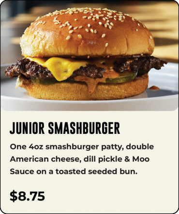 Junior Smashburger with cheese, pickle, and sauce on a seeded bun.