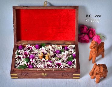 Pellipoolajada_EngagementRingTrays_Tirupati: Engagement Ring trays made of wood and flowers