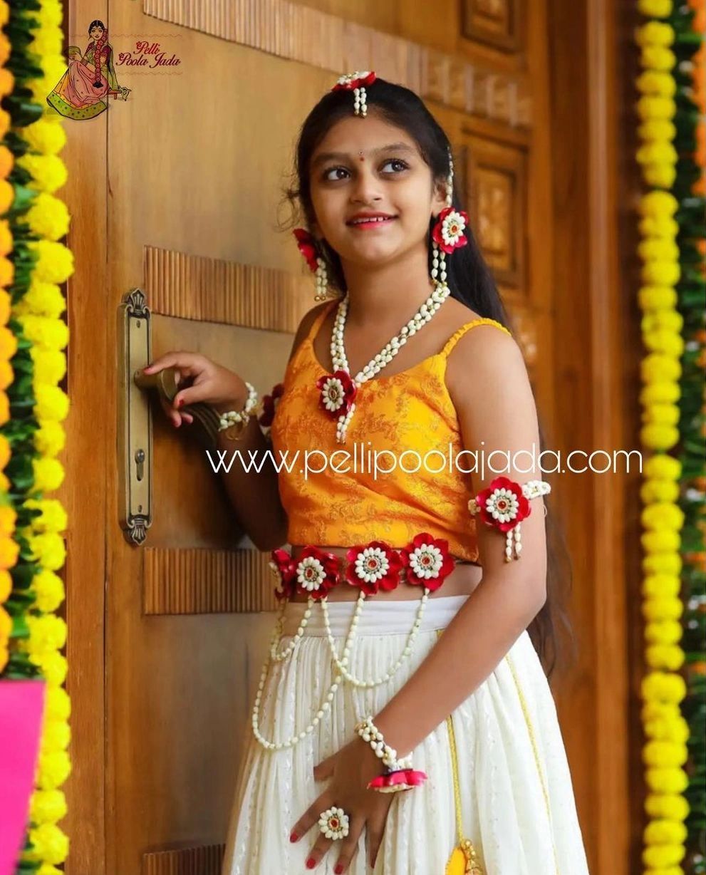 Yes The half saree ceremony got a new addition to its tradition floral jewelry