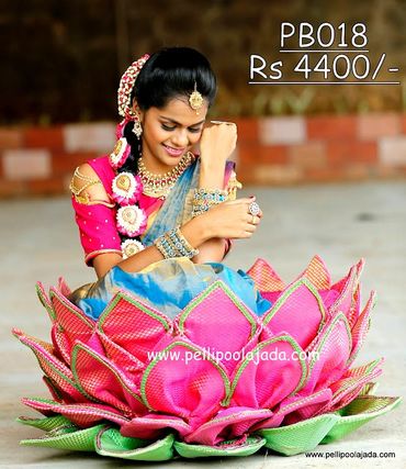 Pellipoolajada_Pellibutta_Mumbai: Lotus shaped pellibutta in pink and green color