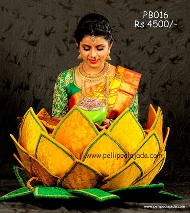 Pellipoolajada_Pellibutta_Hyderabad: Lotus shaped pellibutta in yellow and green color