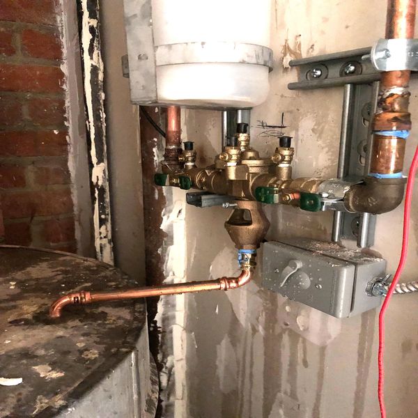 Backflow preventer Installation on soda equipment.