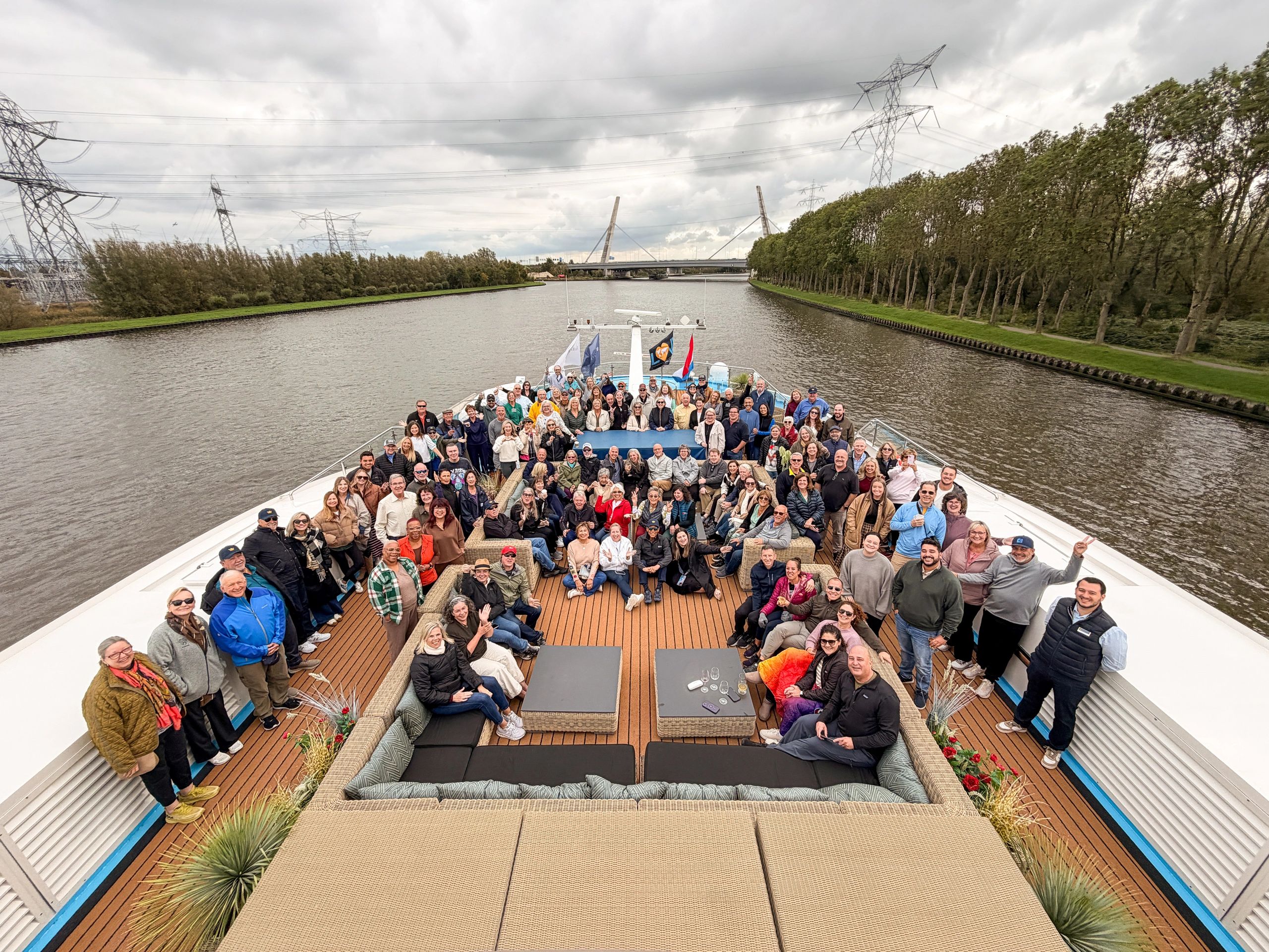 Group of friends reconnecting during a scenic cruise