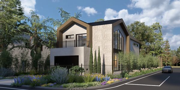 Modern two-story house with a unique angular roof design.