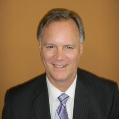 Kevin K. Johnson, author of The American Oath Project, headshot. Lawyer in suit and tie smiling.
