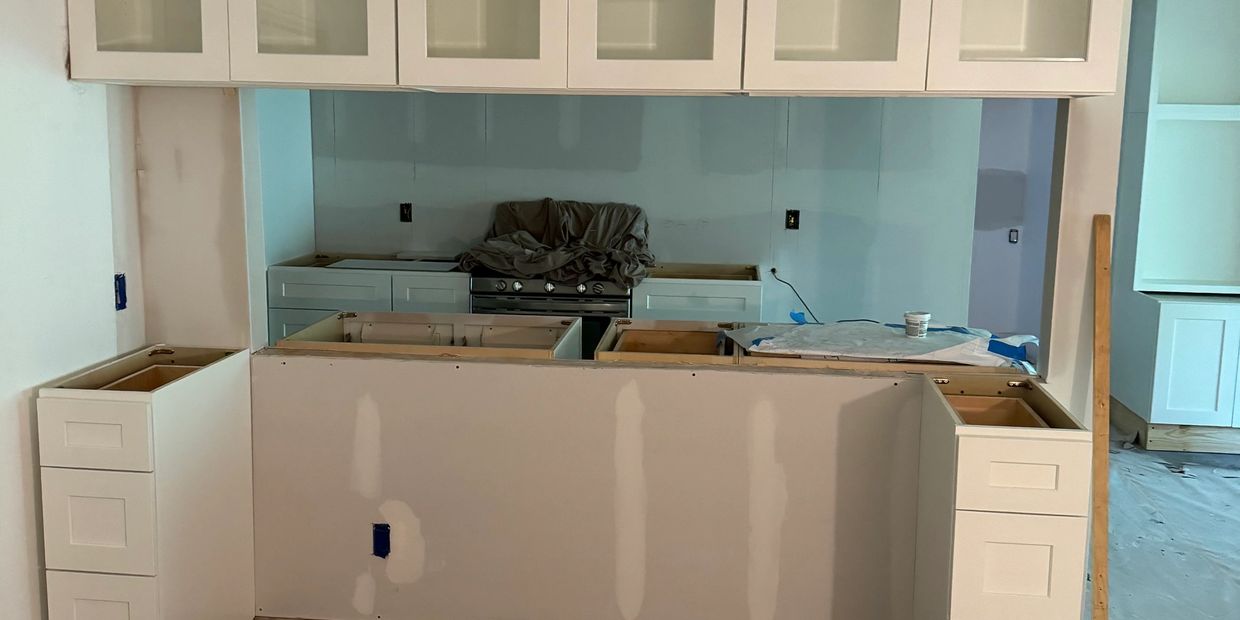 Total property update with low-voltage wiring, leveled foundation, and load-bearing wall removal.