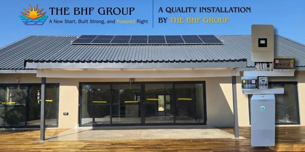 Solar panel installation on a modern house roof by The BHF Group.