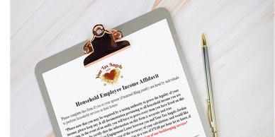 Household Employee Income Affidavit on a clipboard with a pen.