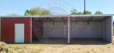 Single sloped metal lean to with enclosed storage.