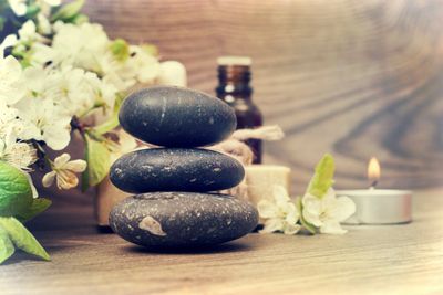 stacked rocks flower candle