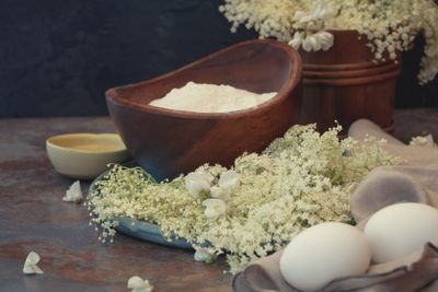 A wooden bowl with baking flour 