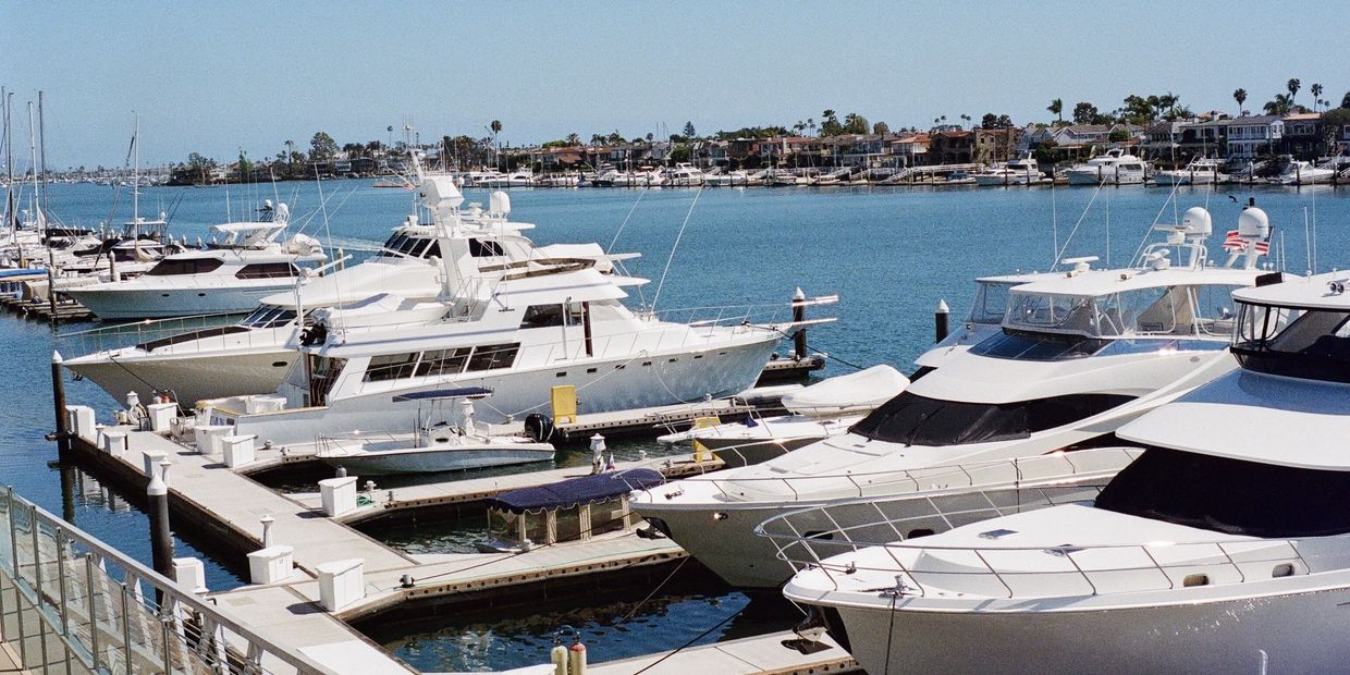 Yachts parked at marina