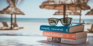 Sunglasses, reading books on the beach