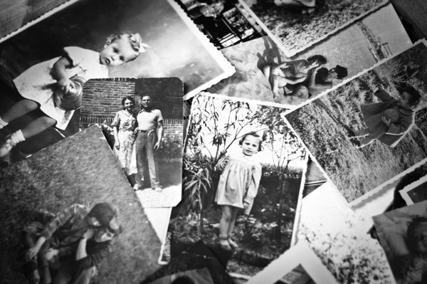 A collection of vintage black-and-white family photographs.