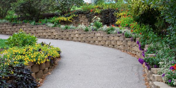 Multi-level landscaping with brick paver retaining walls