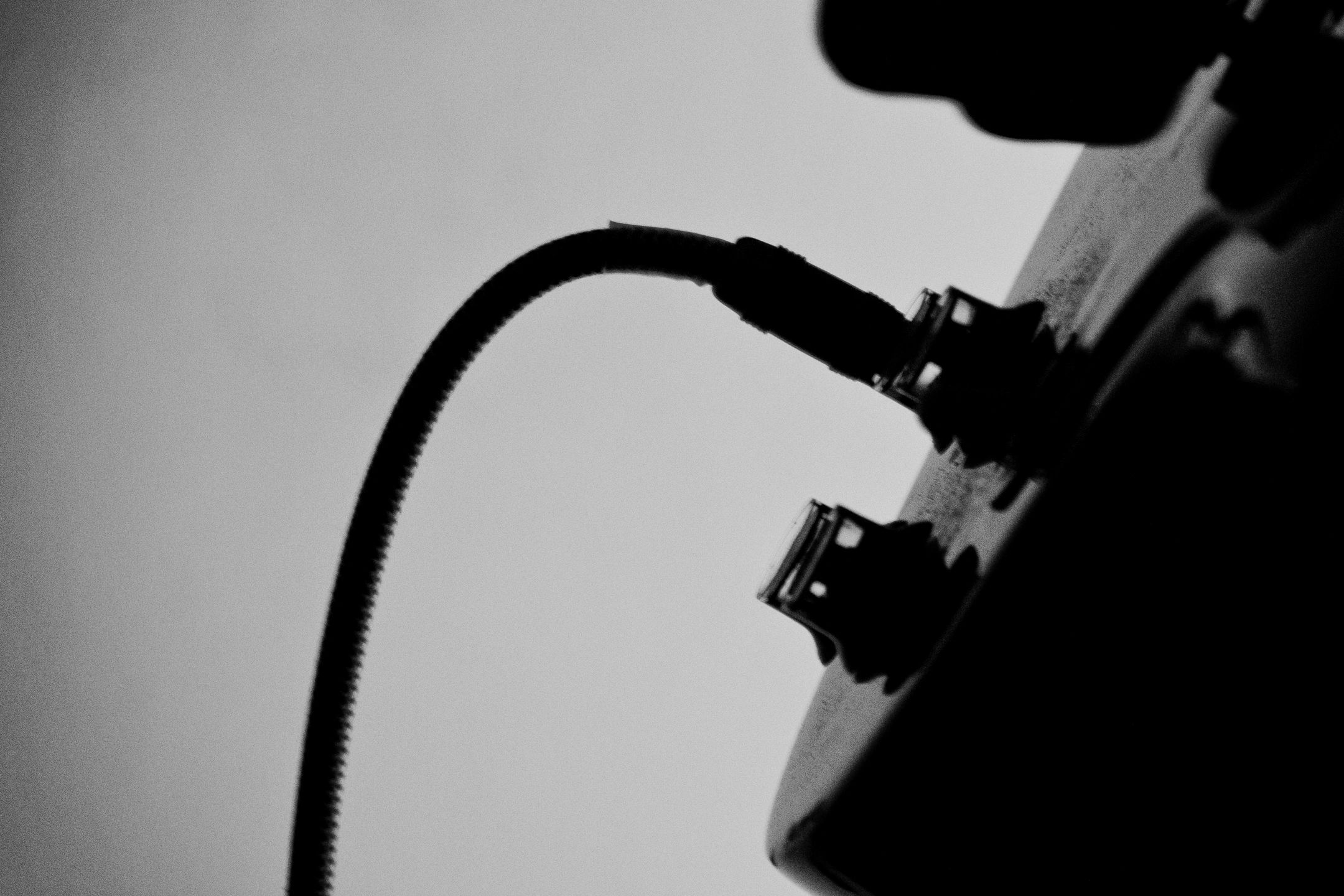 An audio Jack Plugged in to a Mixing Desc
